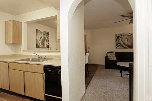 silverado apartment interior kitchen and hallway looking into living room